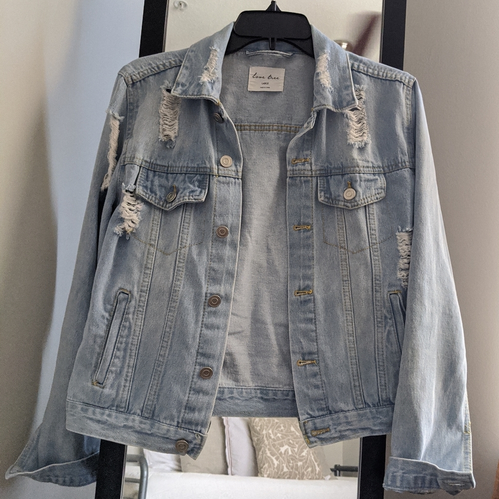 Distressed denim jacket